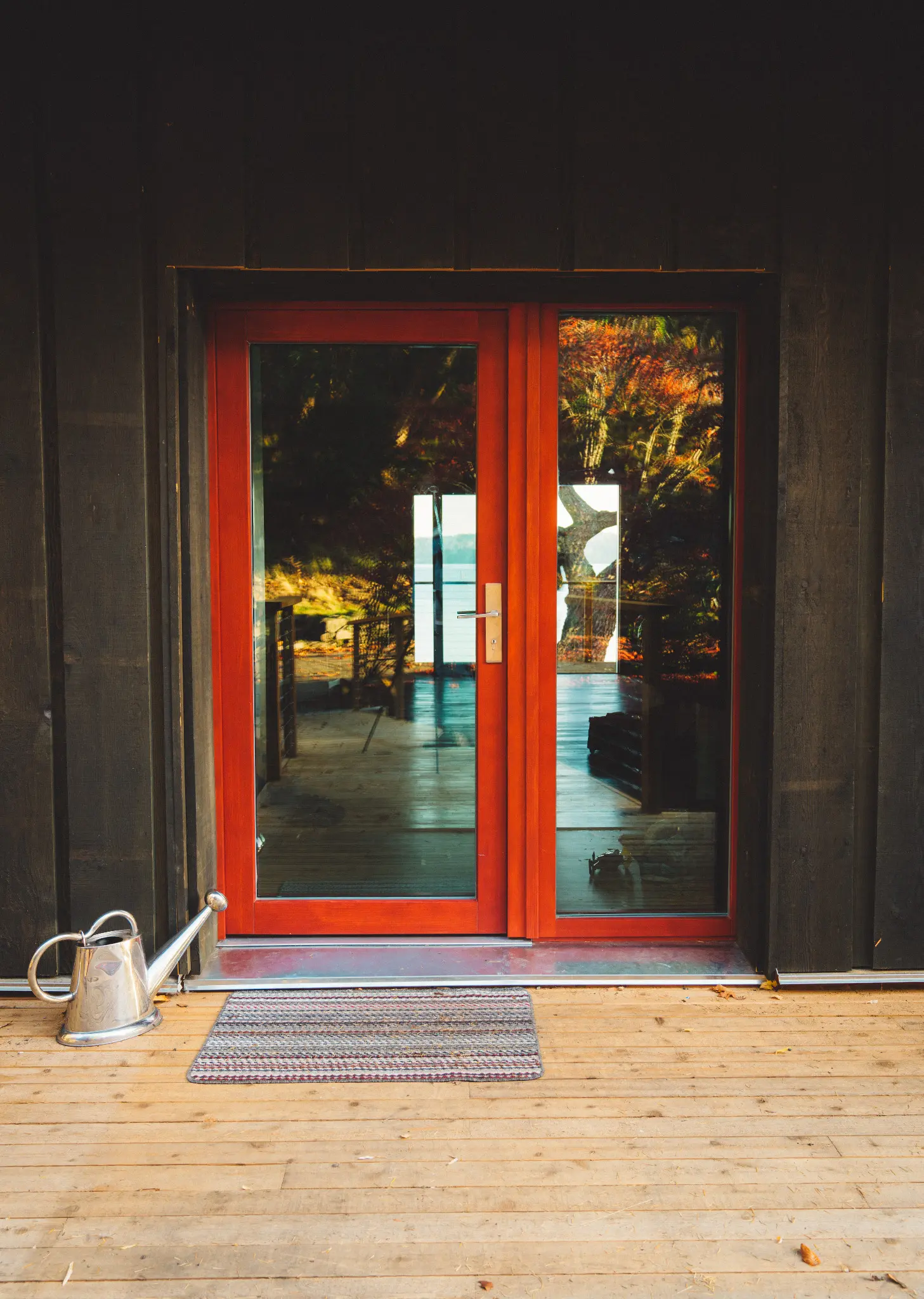 Custom red Fenstür front entry door and sidelite at the Green Point Project