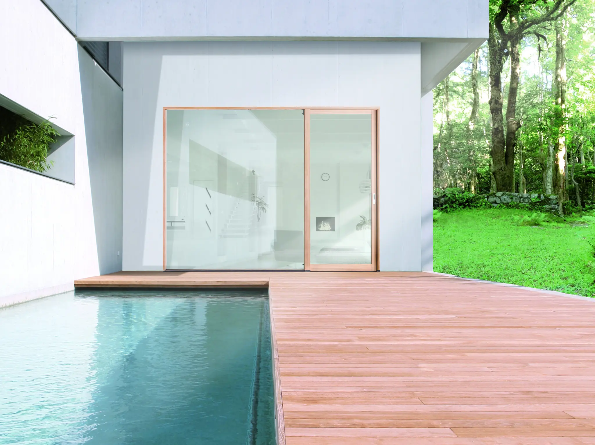 Minimal-frame Imago lift-and-slide system beside a modern pool terrace
