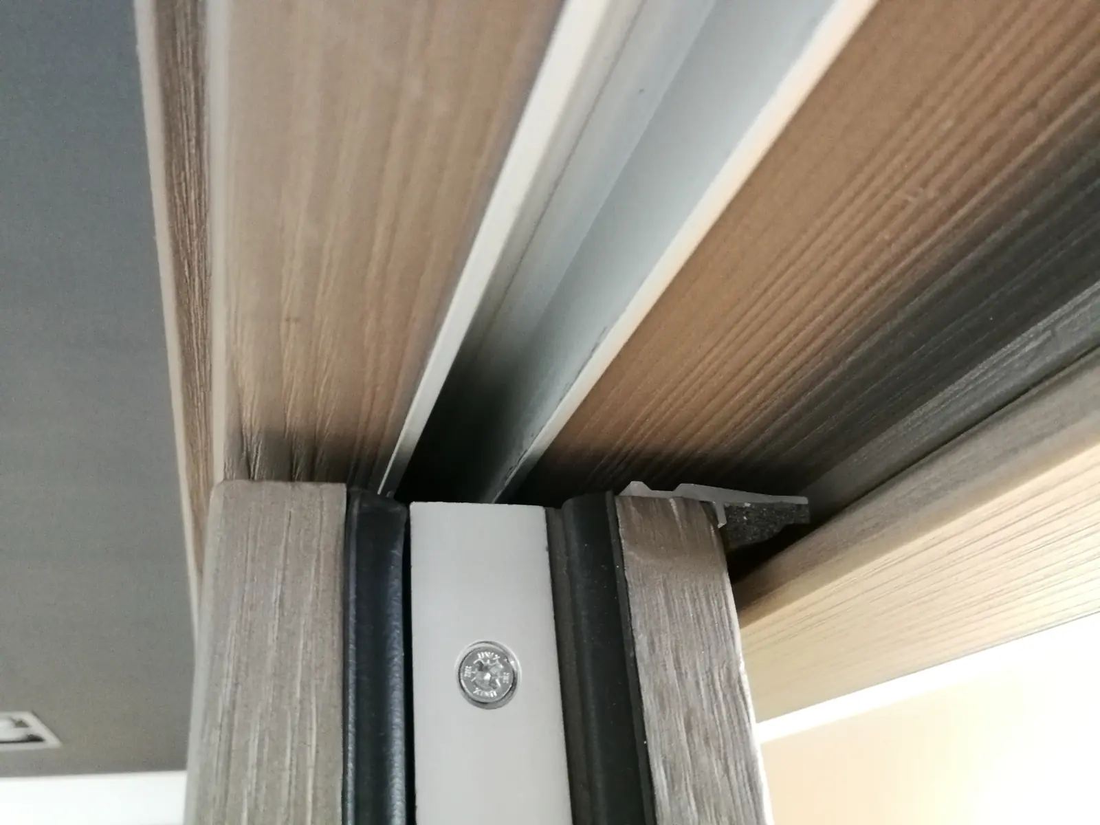 Installed Imago head and jamb detail with concealed track and seals