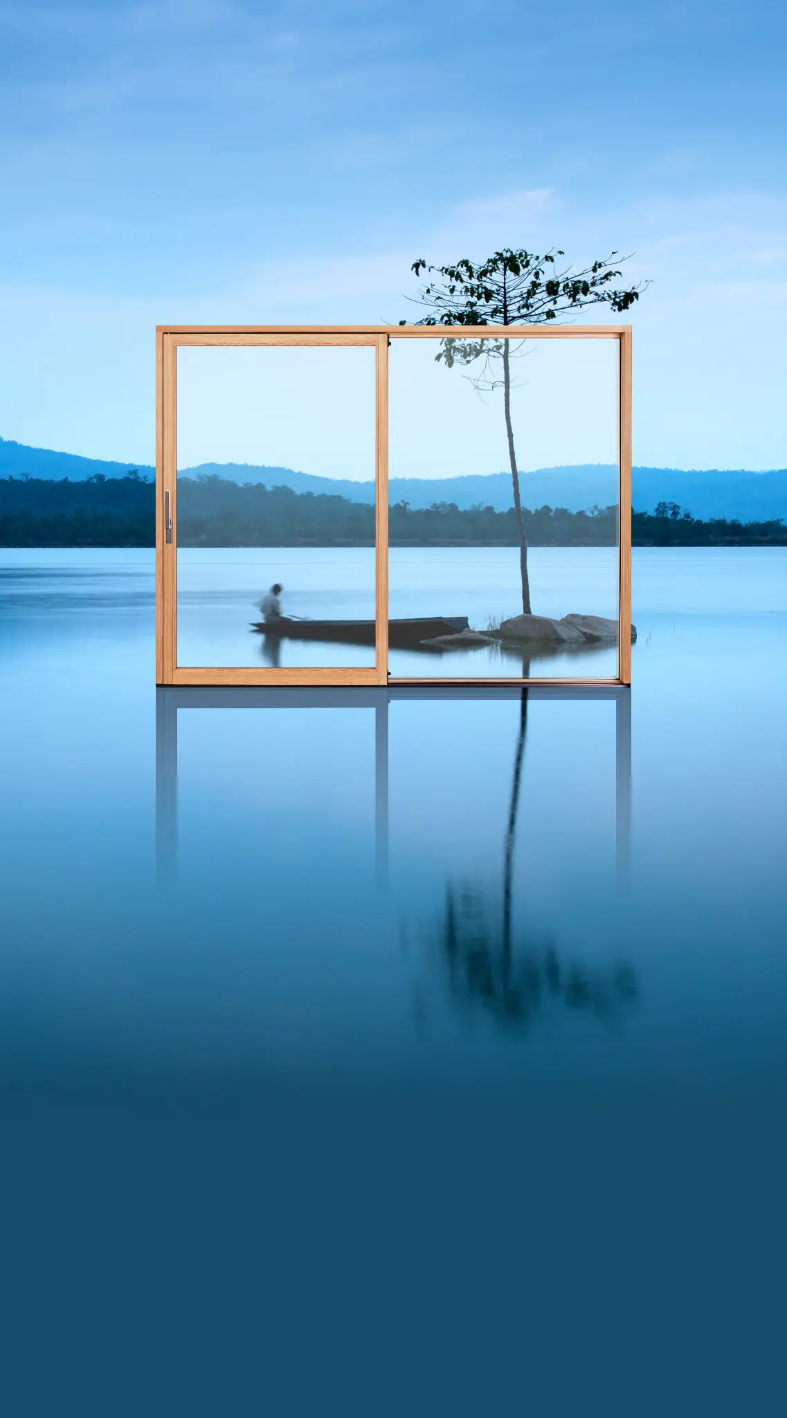 Imago lift-and-slide system with a broad moving panel framing a lakeside view