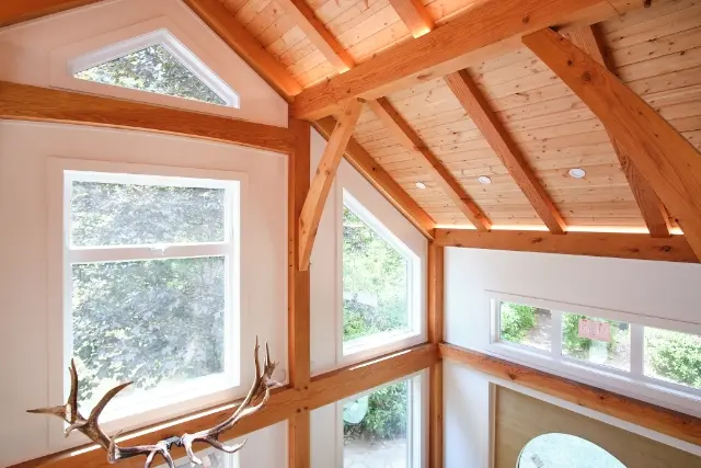 Custom Fenstür picture windows arranged around a timber interior corner