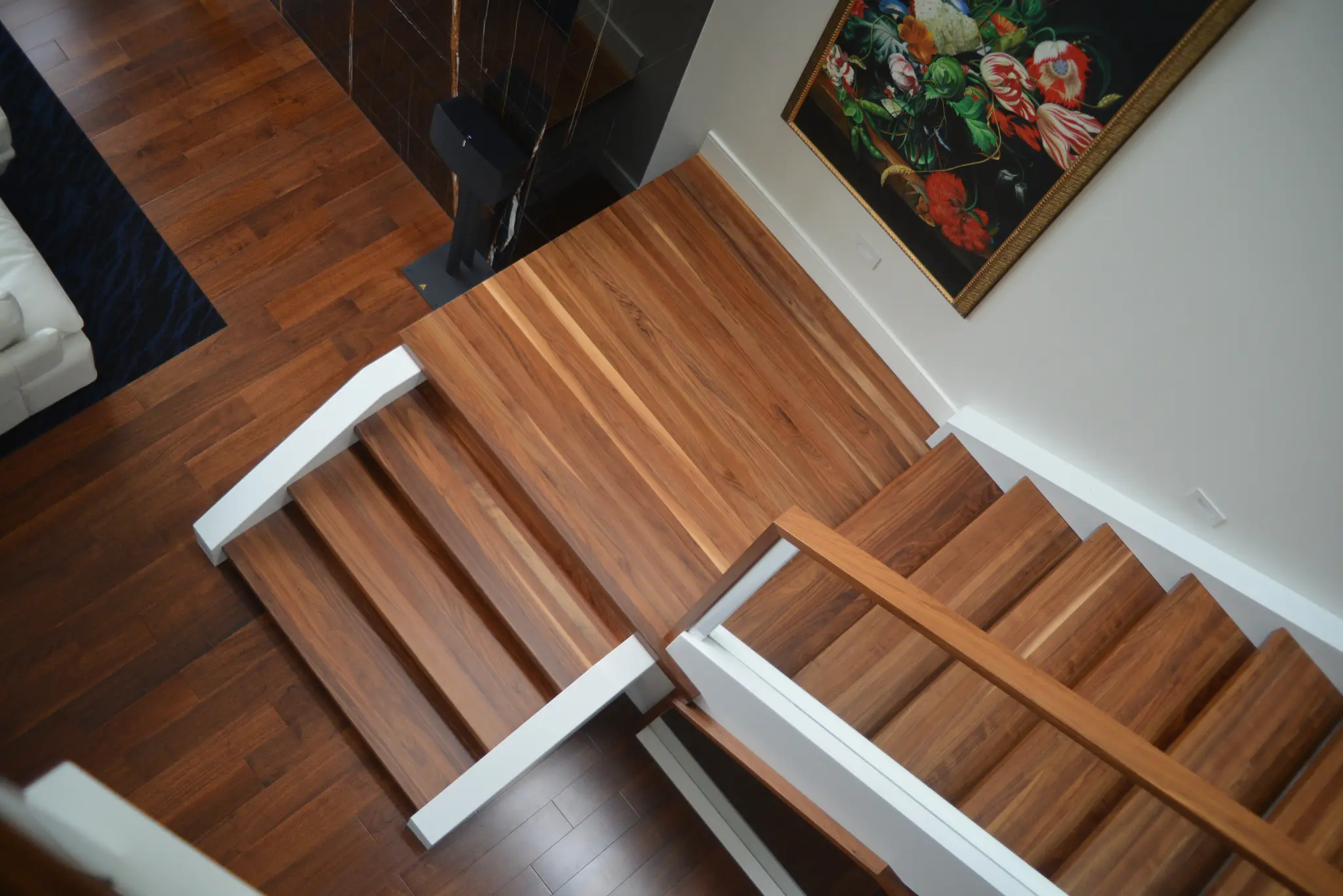 Black walnut stair and landing viewed from above