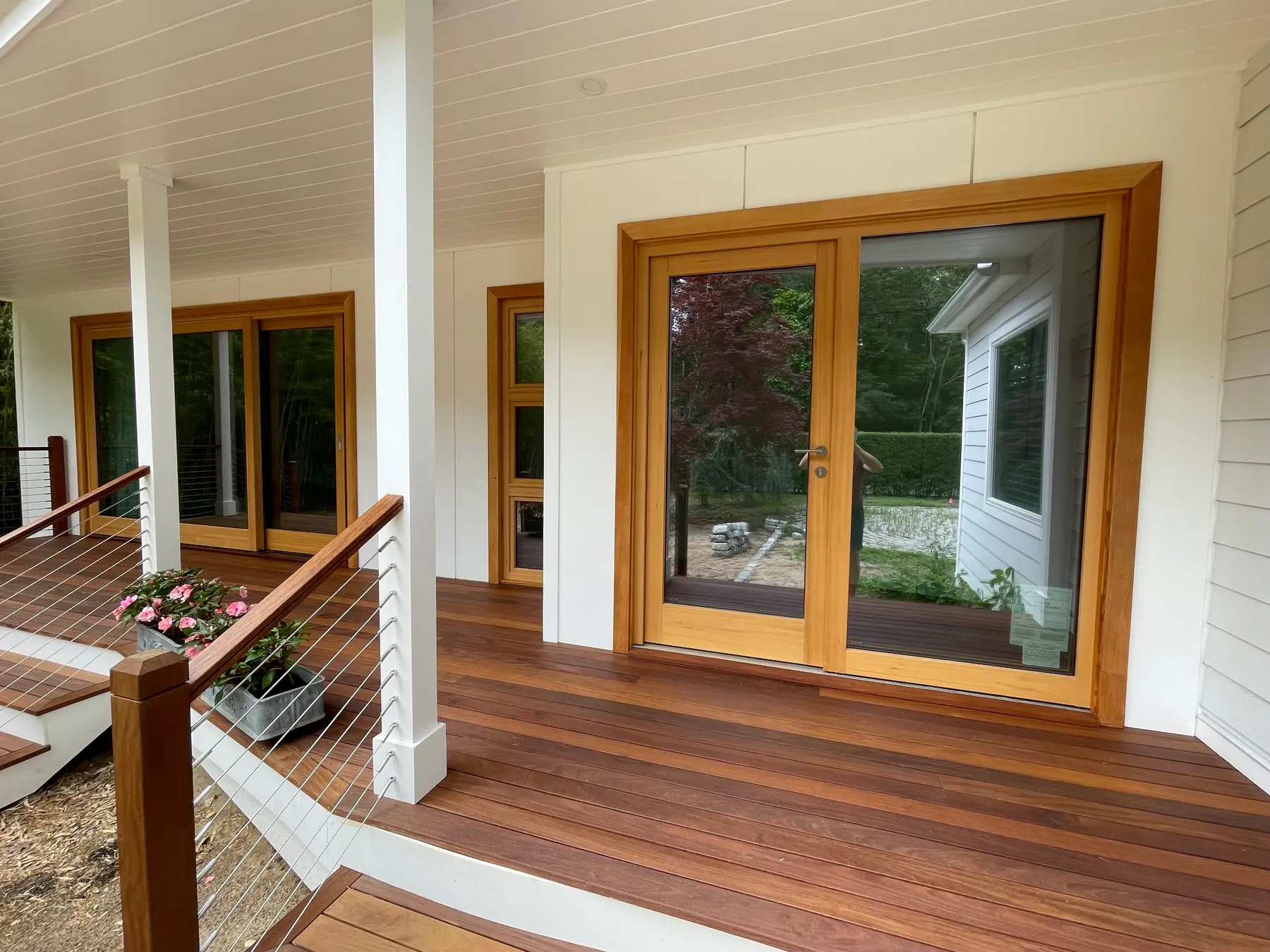 Wood doors connecting the home to the terrace