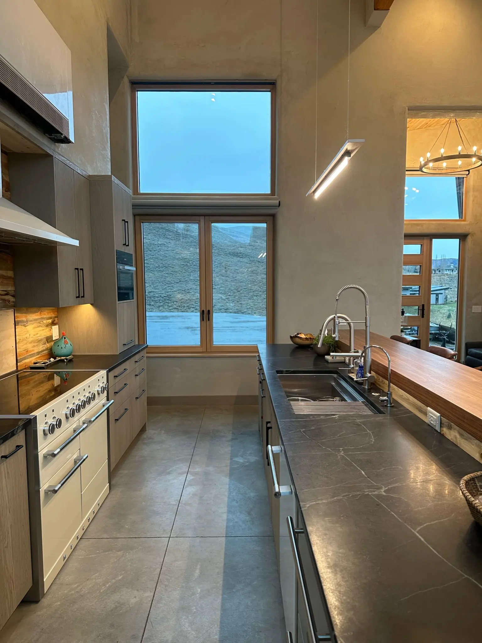 Tall kitchen window composition overlooking the hills