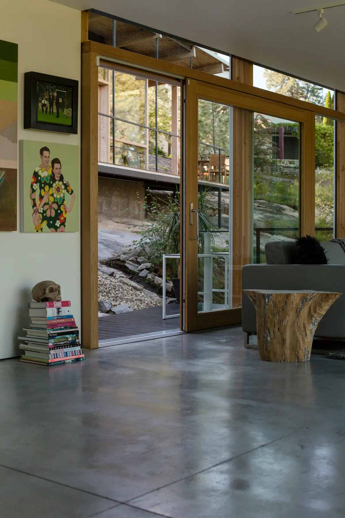 Wood door incorporated into a glazed wall