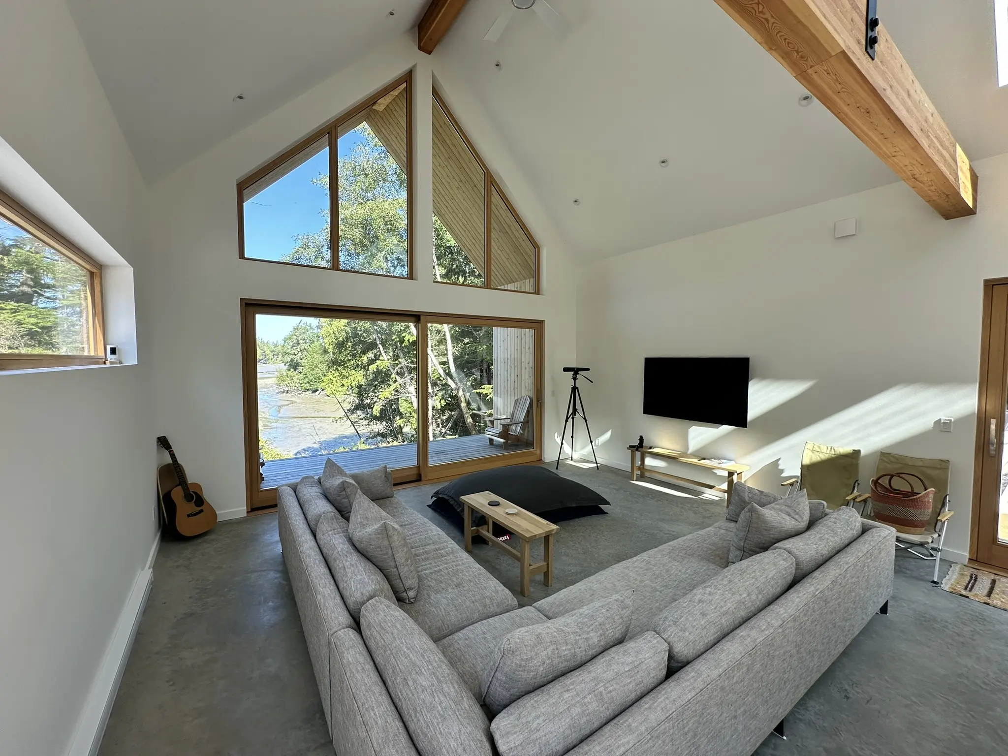 Tofino oceanfront living room with an all-wood Fenstür window wall