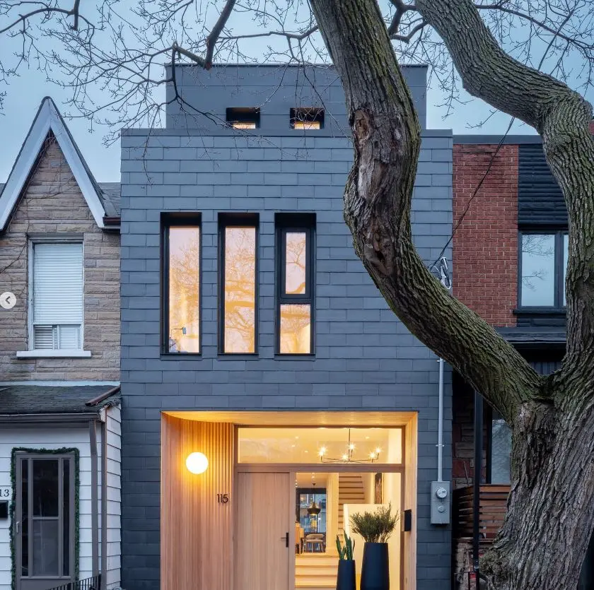 Contemporary Toronto home with a custom Fenstür natural-wood entrance, transom and sidelite