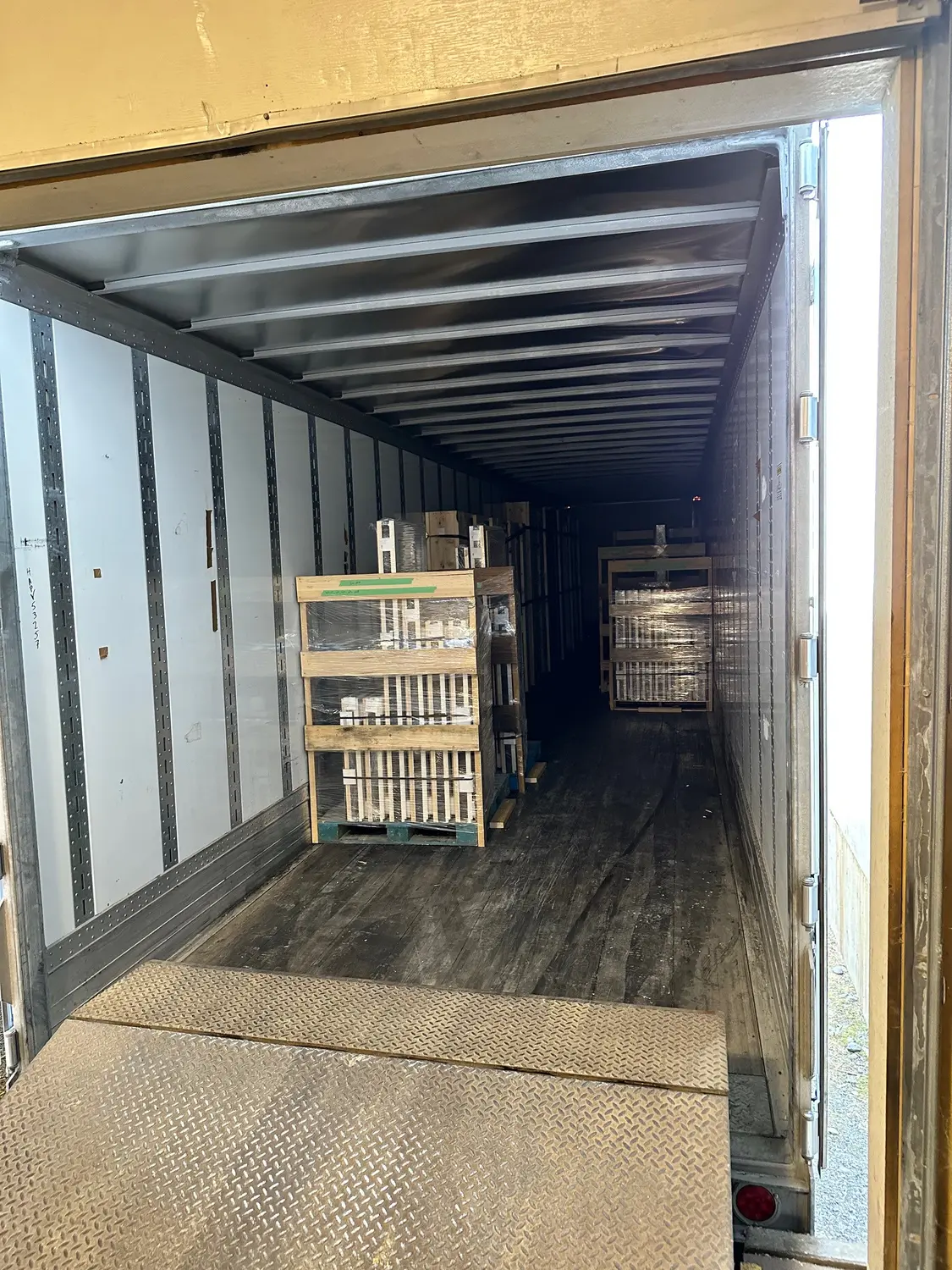Commercial freight trailer positioned for a coordinated carrier pickup
